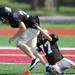 Dexter High School football players participate in a drill during practice at the school on Friday, August 16, 2013. Melanie Maxwell | AnnArbor.com